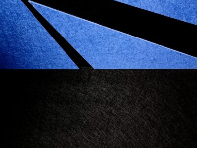 a close up of a black and blue background