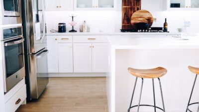 two brown bar chairs